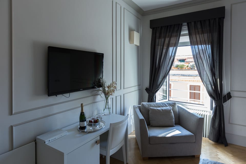 Superior Double Room | Minibar, in-room safe, desk, laptop workspace