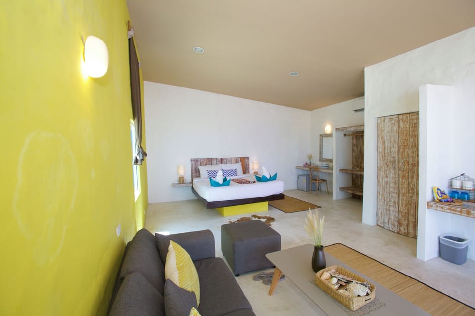 Suite, Beachfront | Hypo-allergenic bedding, minibar, in-room safe, individually decorated