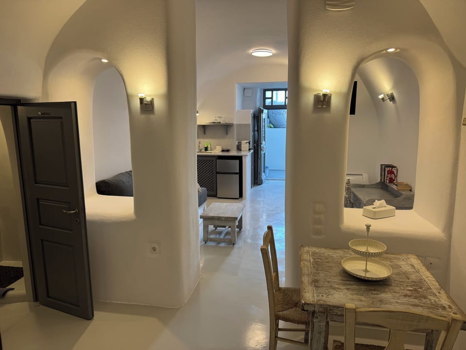 Grande Suite with Hot Tub & Sunset View | Living area | Flat-screen TV