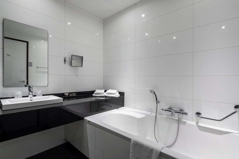 Deluxe Room, 2 Twin Beds | In-room safe, desk, laptop workspace, blackout drapes