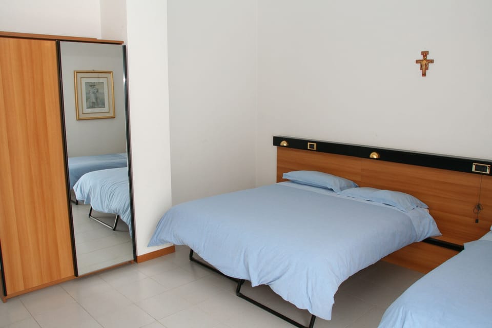 Triple Room | Desk, blackout drapes, free WiFi, wheelchair access