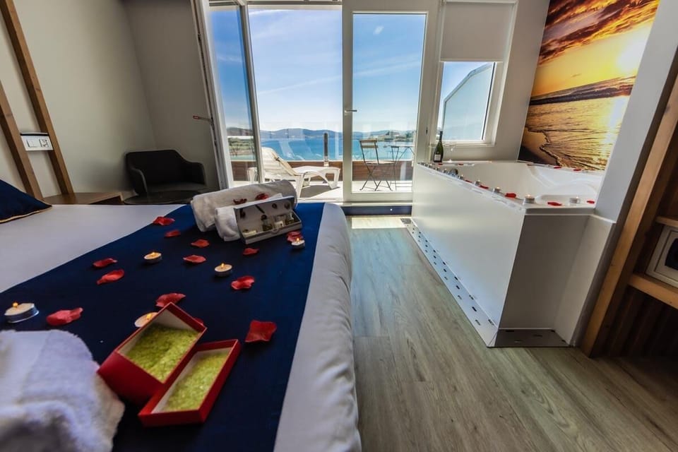 Deluxe Double Room, 1 King Bed | Down comforters, memory foam beds, iron/ironing board, cribs/infant beds