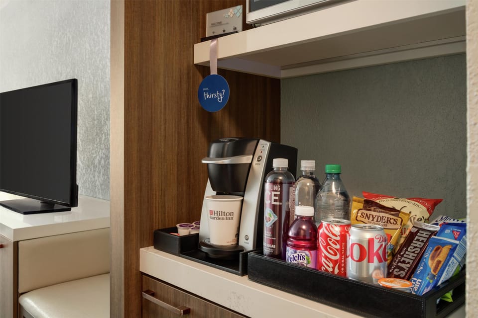 Desk, blackout drapes, iron/ironing board, cribs (surcharge)