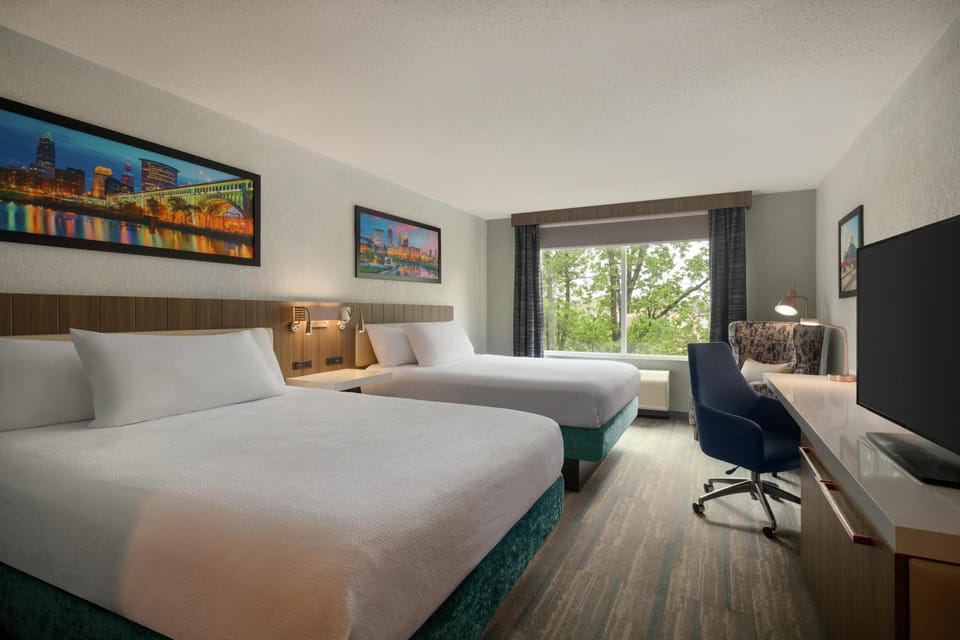 Desk, blackout drapes, iron/ironing board, cribs/infant beds