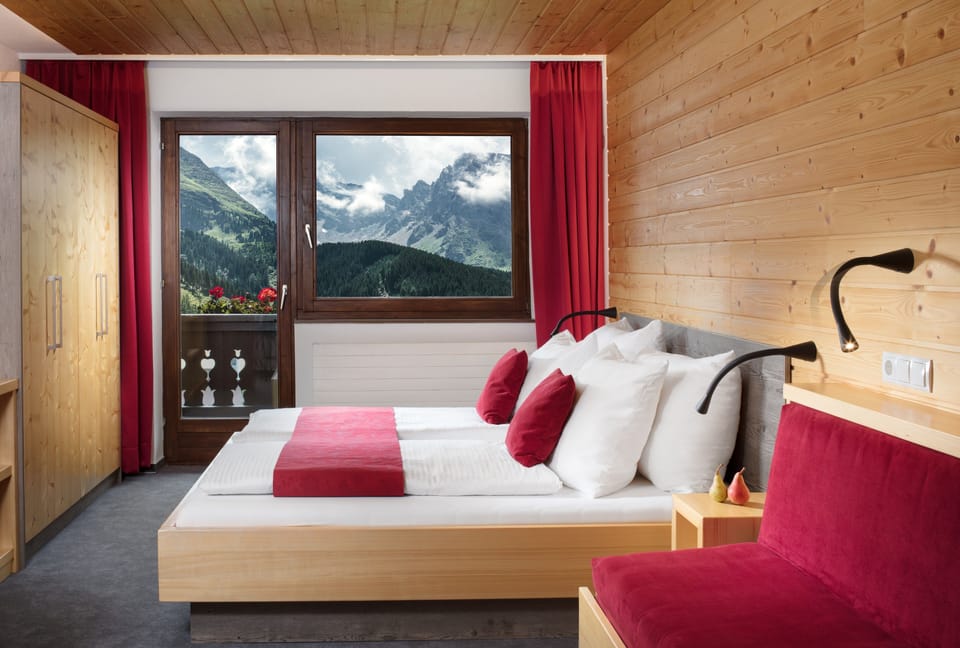 Deluxe Double Room, Balcony, Mountain View | Hypo-allergenic bedding, in-room safe, desk, laptop workspace