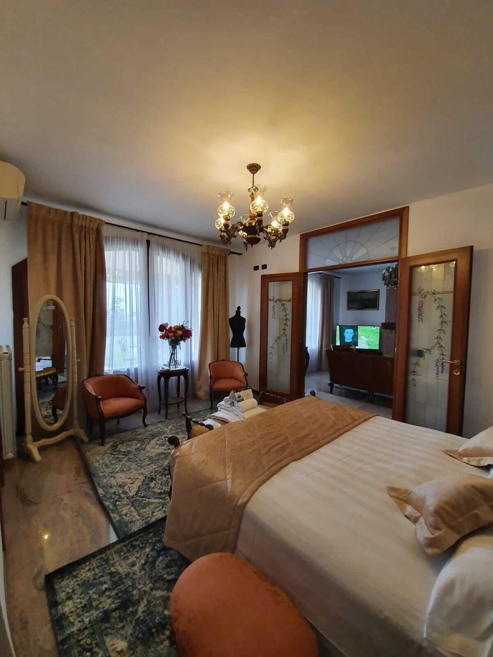 Luxury Suite, Jetted Tub | Minibar, in-room safe, individually decorated, desk