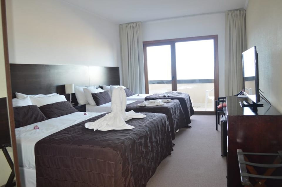 Standard Quadruple Room, 1 Bedroom | In-room safe, free cribs/infant beds, bed sheets