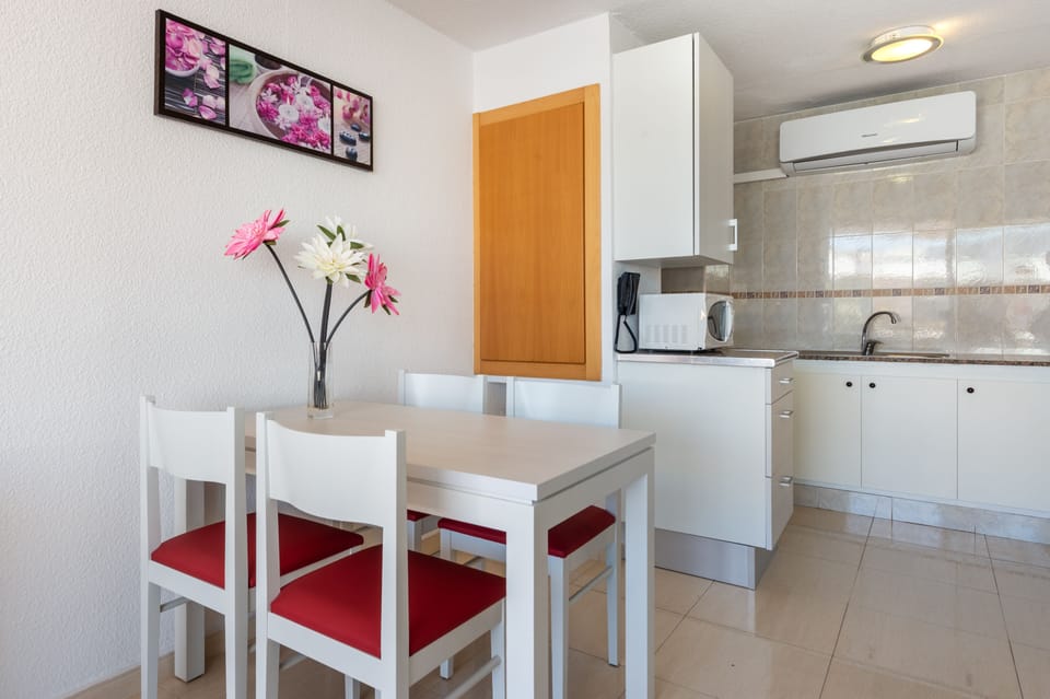 Apartment, 1 Bedroom, Balcony, Partial Sea View | Private kitchen | Coffee/tea maker, fridge, microwave, stovetop