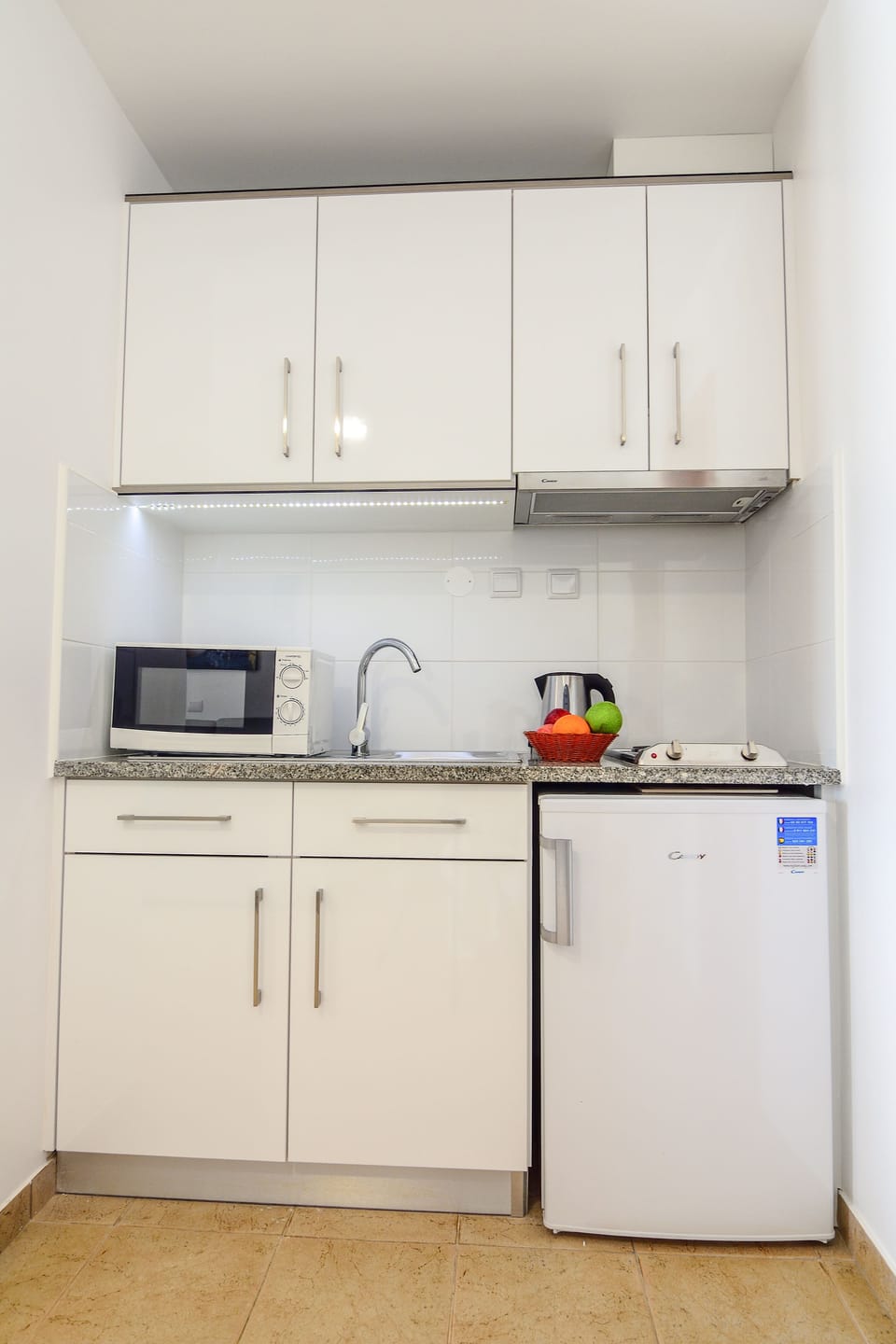 Fridge, microwave, stovetop, electric kettle