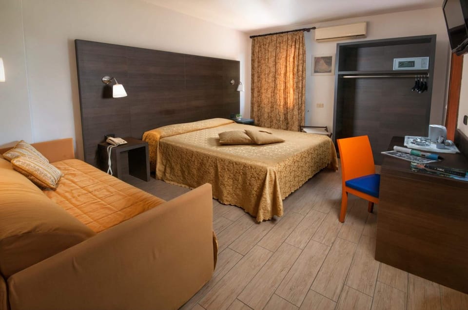 Select Comfort beds, minibar, in-room safe, desk