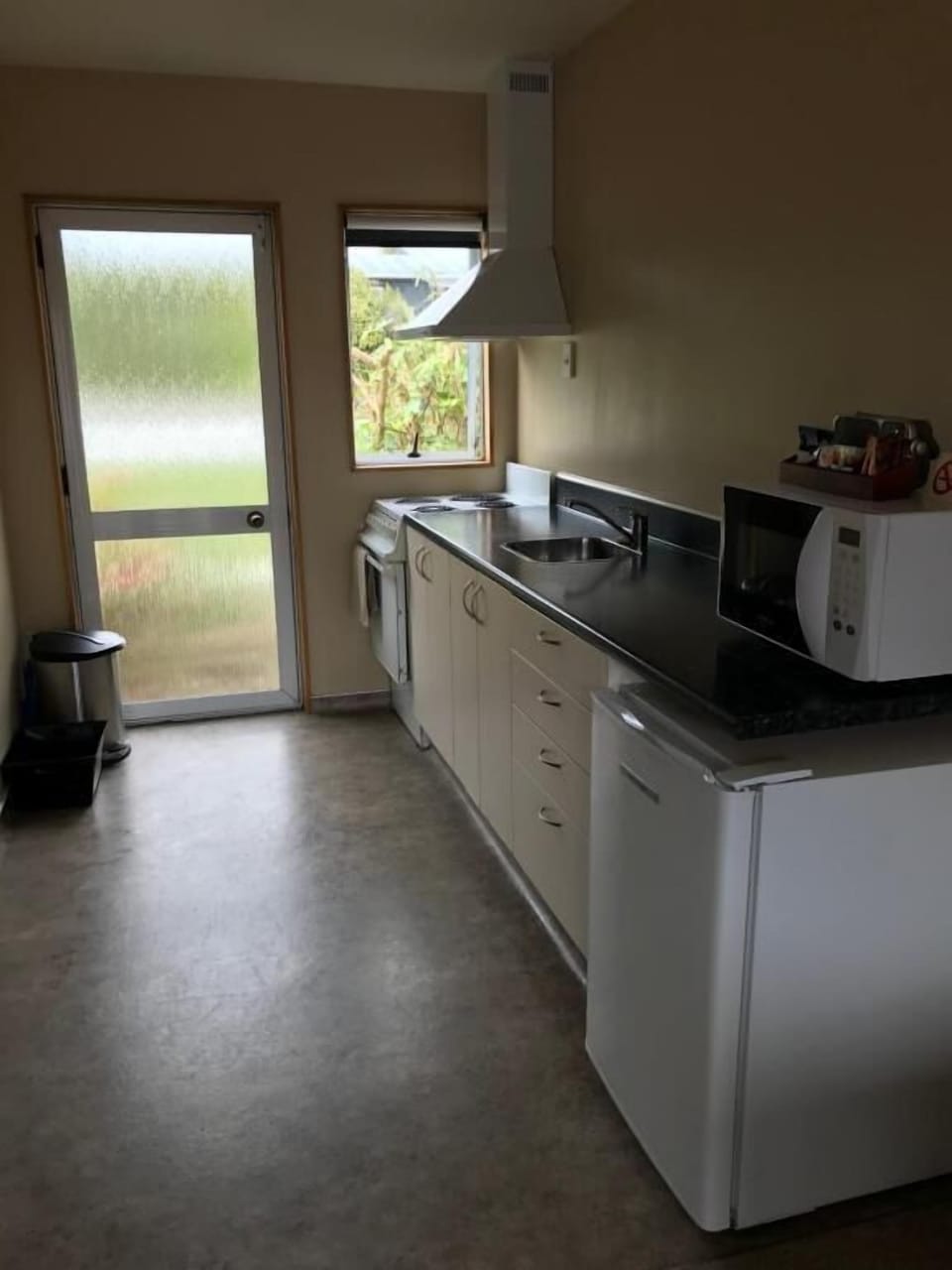 Coffee/tea maker, fridge, electric kettle, cookware/dishes/utensils