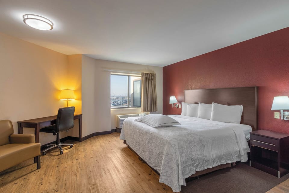 Desk, blackout drapes, cribs (free), WiFi (free)