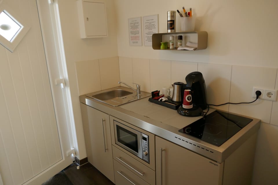 Individually furnished, desk, laptop workspace, bed sheets