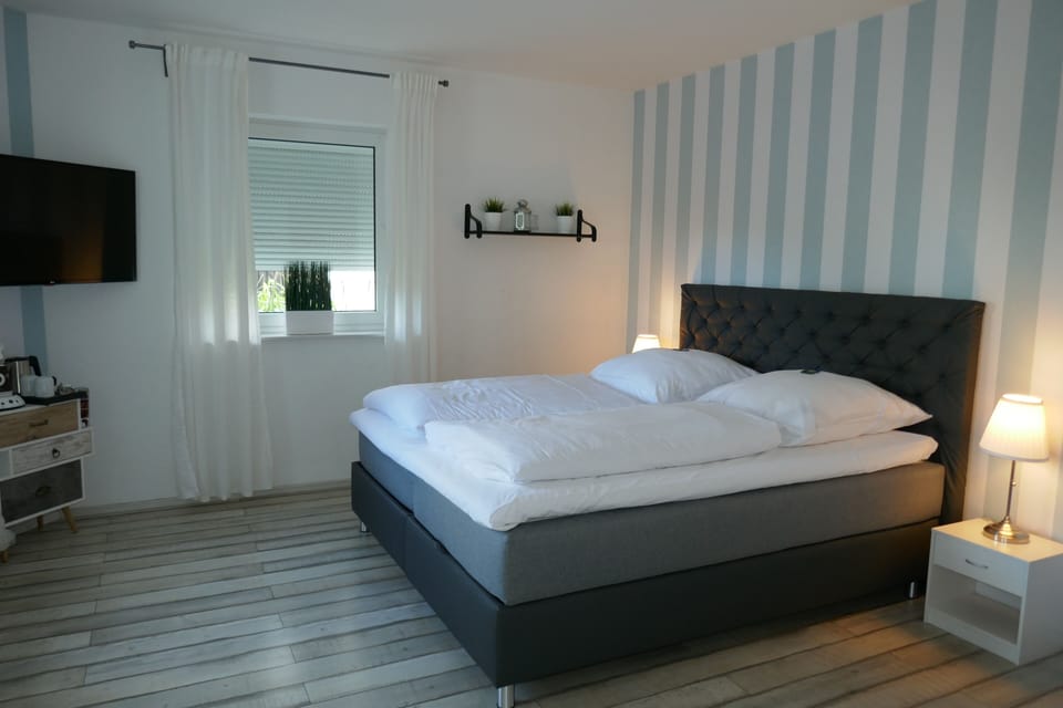 Individually furnished, desk, laptop workspace, bed sheets