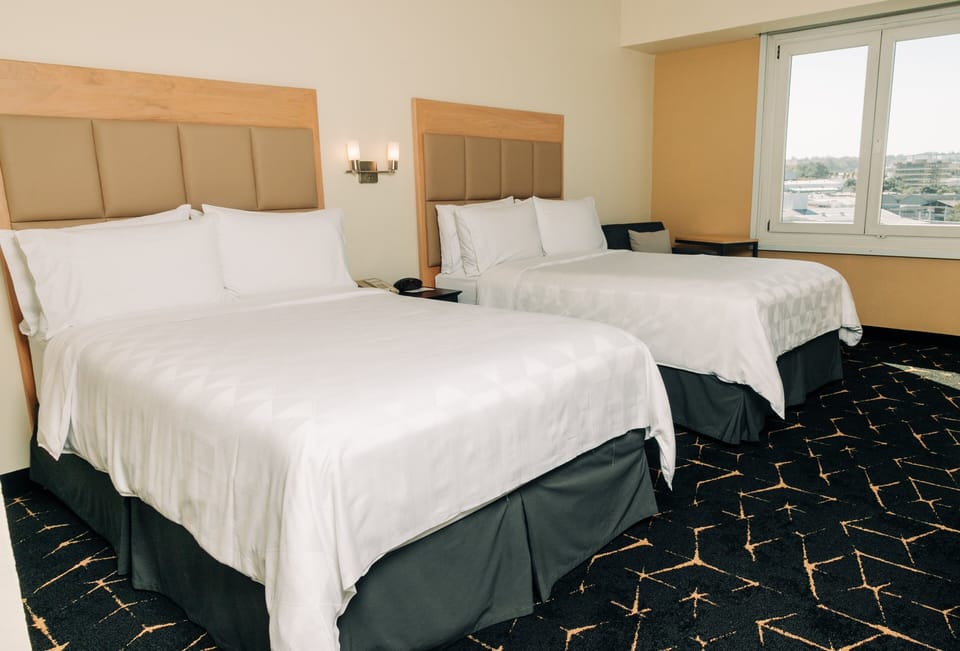 In-room safe, desk, iron/ironing board, cribs (free)