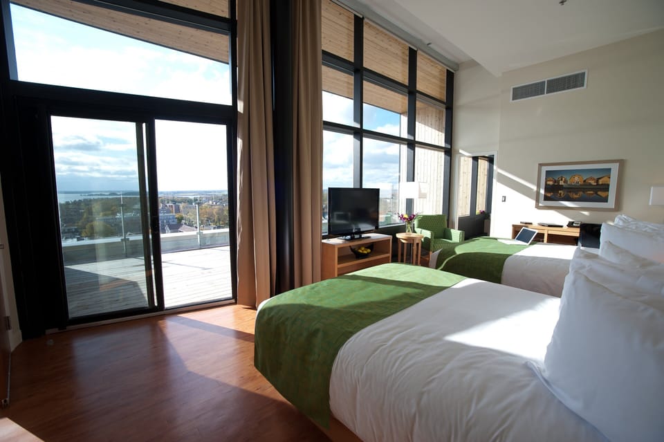 Premium bedding, down comforters, pillowtop beds, in-room safe