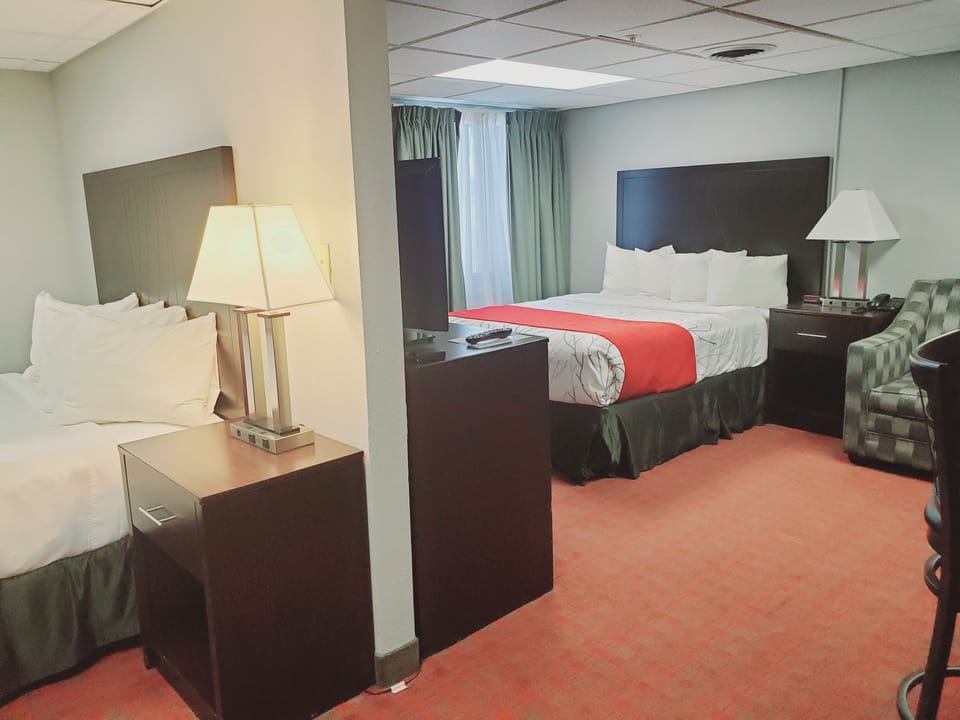 Family Suite (2 Queen) | Desk, laptop workspace, soundproofing, iron/ironing board