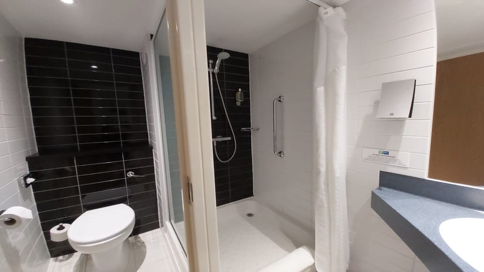 Shower, eco-friendly toiletries, hair dryer, towels