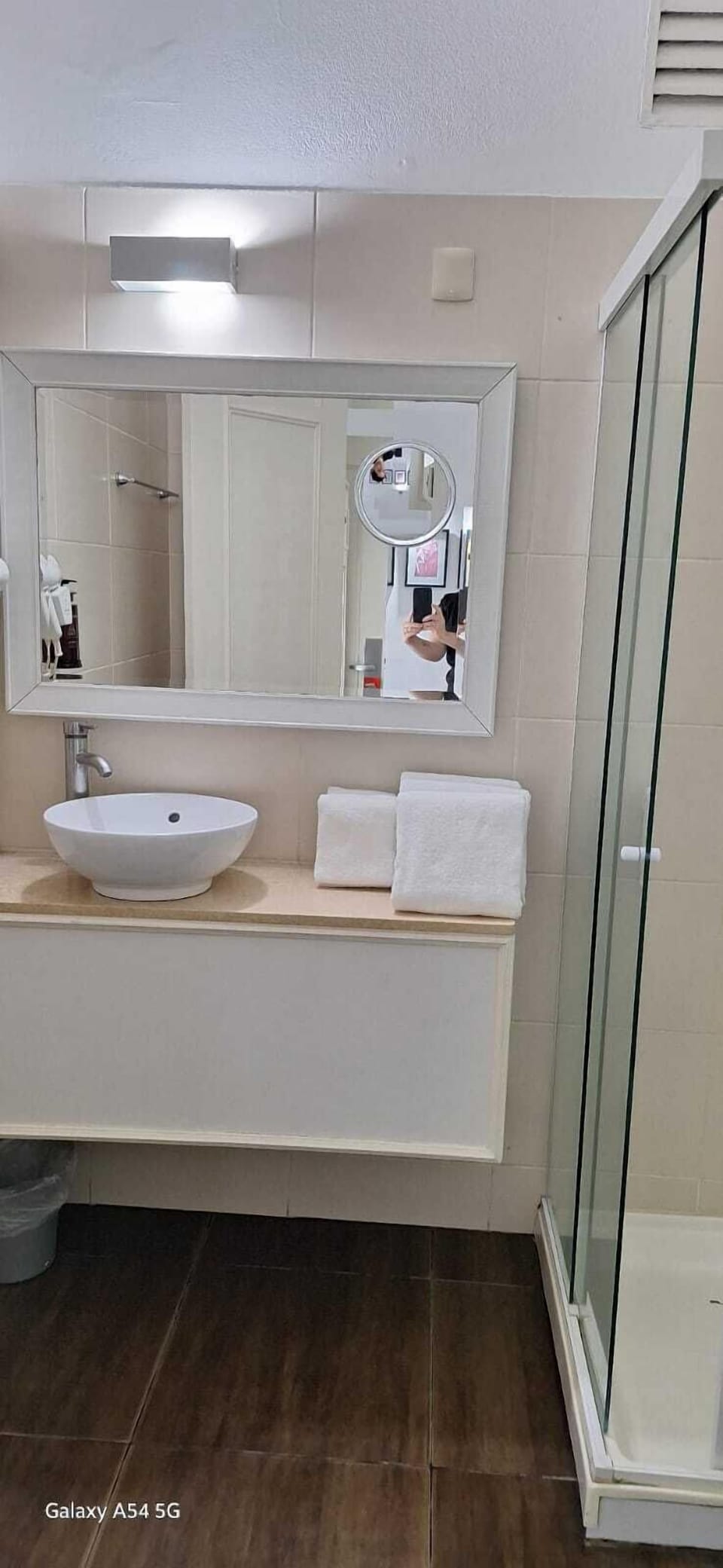 Shower, rainfall showerhead, hair dryer, towels