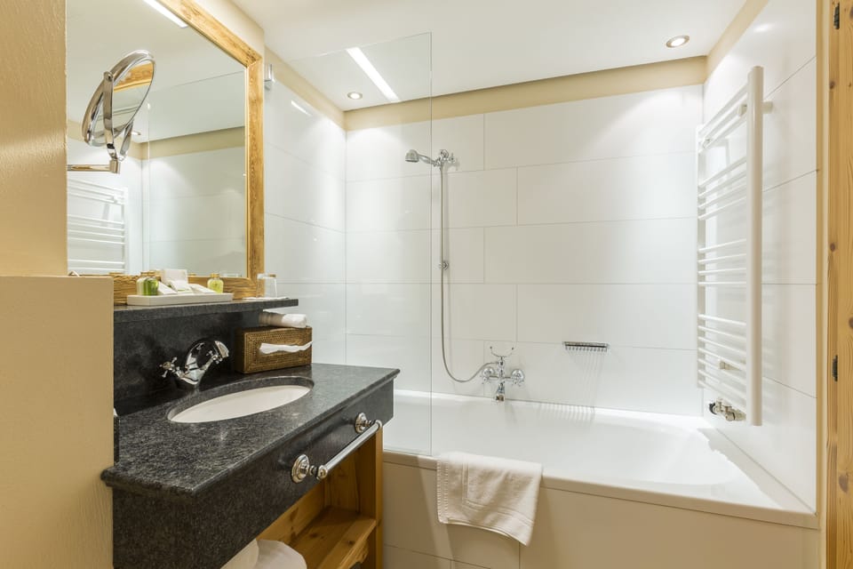 Standard Single Room, Balcony | Bathroom | Separate tub and shower, rainfall showerhead, hair dryer, bathrobes