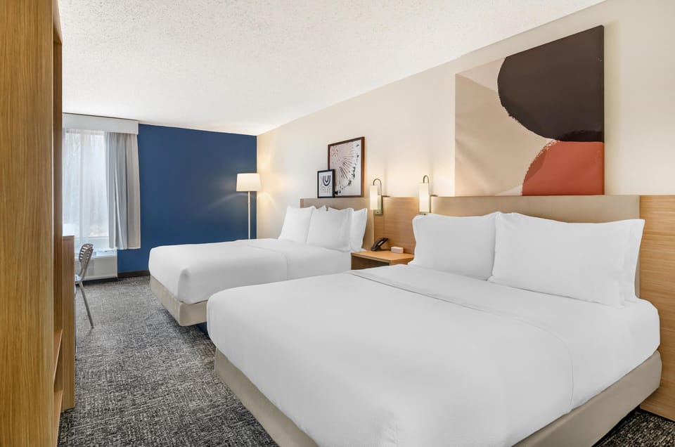 Room, 2 Queen Beds | Desk, laptop workspace, blackout drapes, iron/ironing board