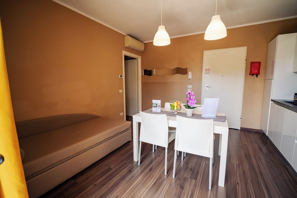Economy Apartment | Living area | 32-inch LCD TV with digital channels, TV, heated floors