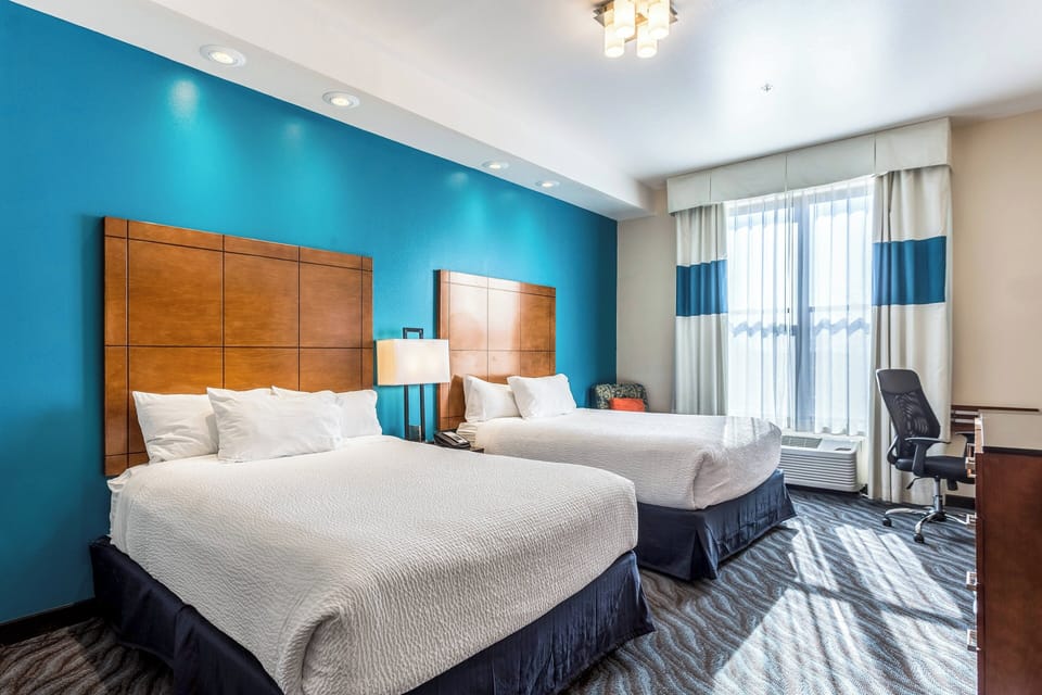 Room, 2 Queen Beds | In-room safe, desk, iron/ironing board, cribs (free)