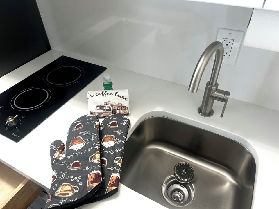 Individually decorated, laptop workspace, iron/ironing board