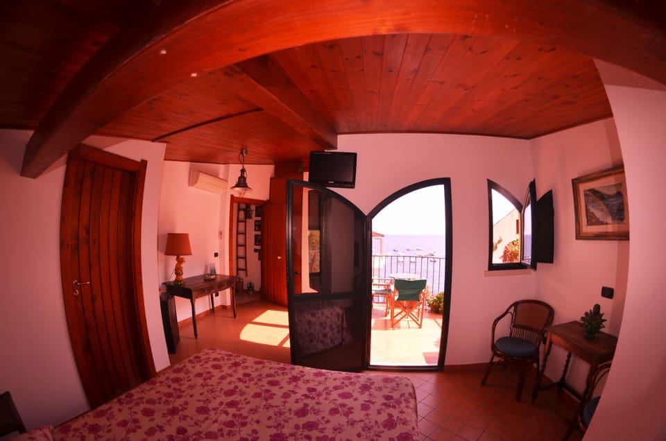 Superior Double Room, Sea View | Minibar, in-room safe, desk, free WiFi