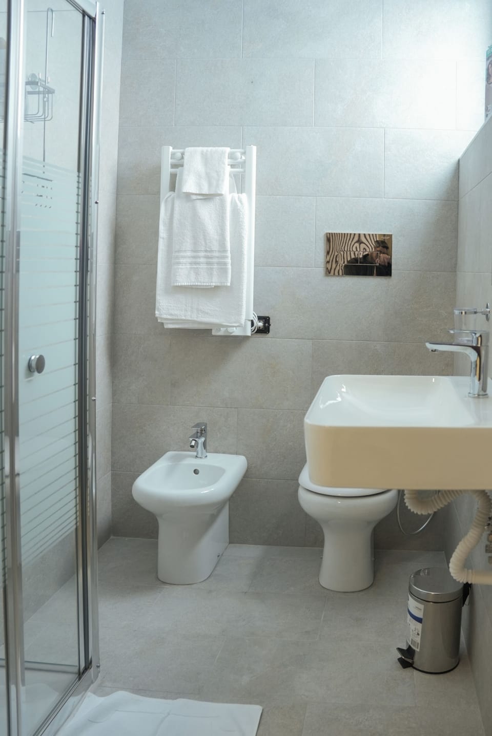 Shower, free toiletries, hair dryer, towels