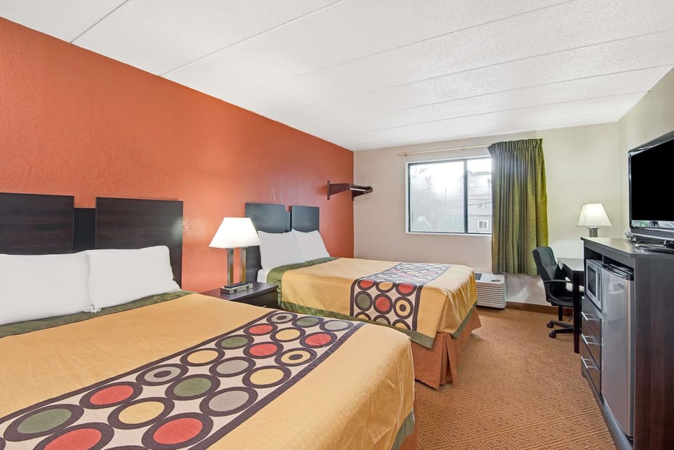 In-room safe, desk, iron/ironing board, free cribs/infant beds