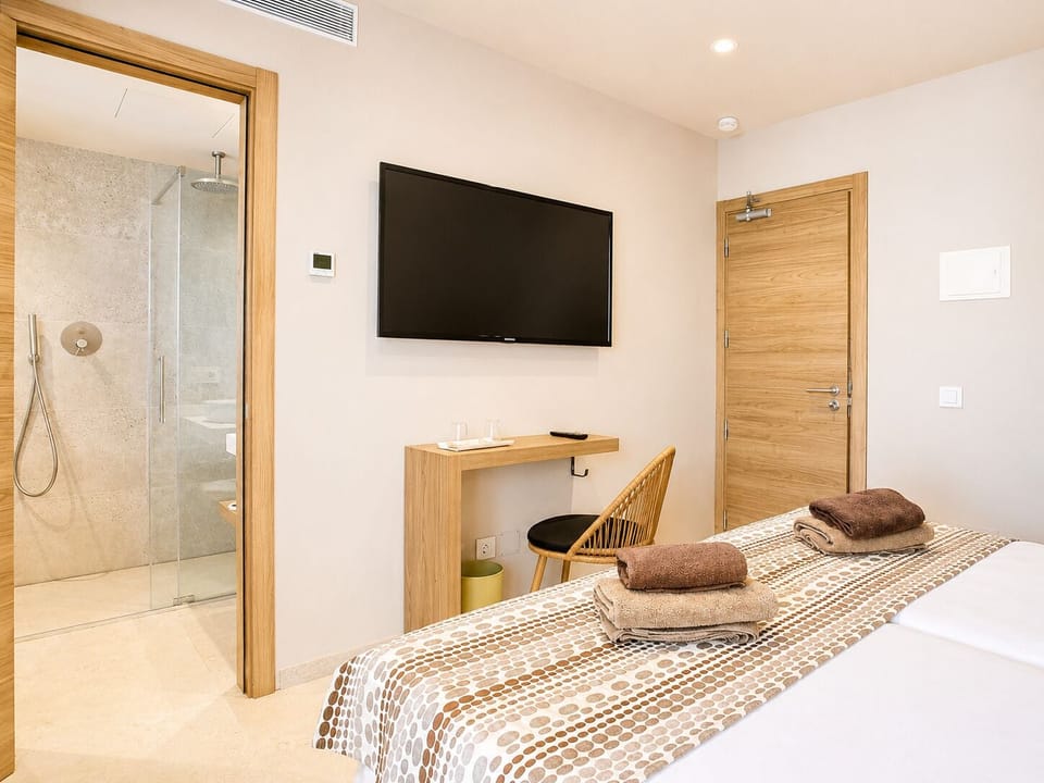 Minibar, desk, blackout drapes, iron/ironing board