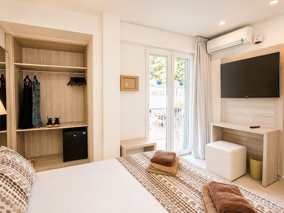 Double or Twin Room, Balcony, Pool View | Minibar, desk, blackout drapes, iron/ironing board