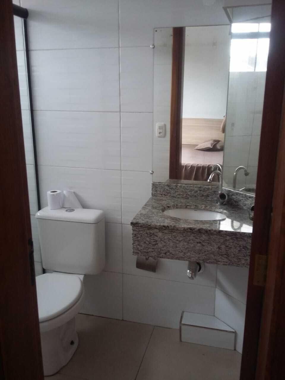 Shower, towels, soap, toilet paper