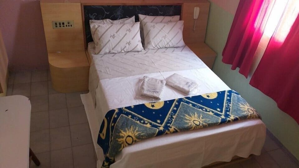 Standard Double Room | Desk, blackout drapes, iron/ironing board (on request), WiFi (free)