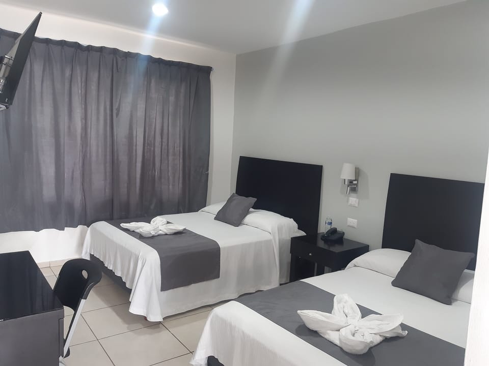 Standard Double Room | Blackout drapes, iron/ironing board (on request), WiFi (free)
