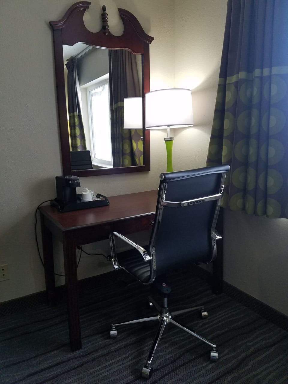 Desk, laptop workspace, blackout drapes, iron/ironing board