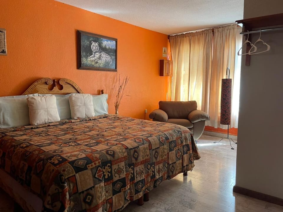 Blackout drapes, iron/ironing board (on request), WiFi (free)