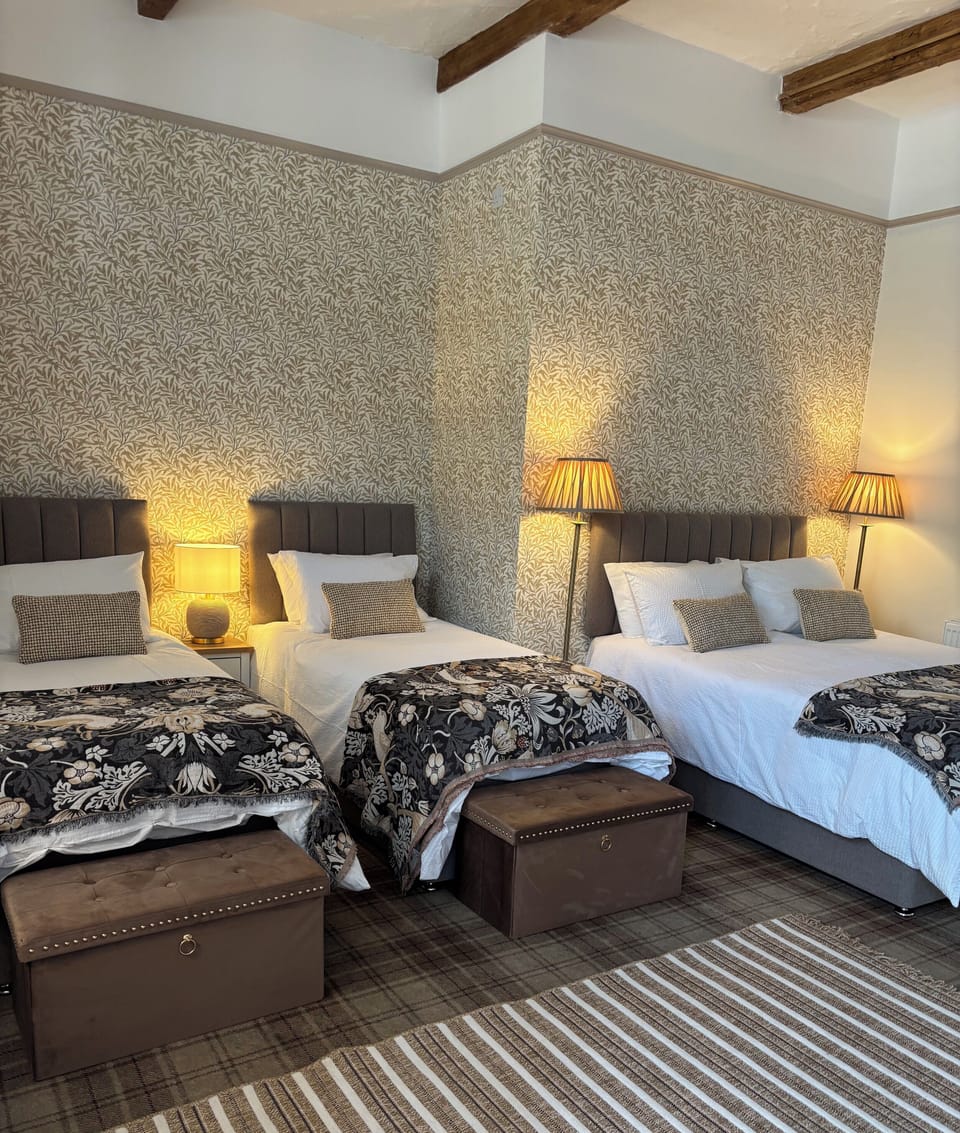 Deluxe Quadruple Room, Multiple Beds (Room 6) | Iron/ironing board, bed sheets