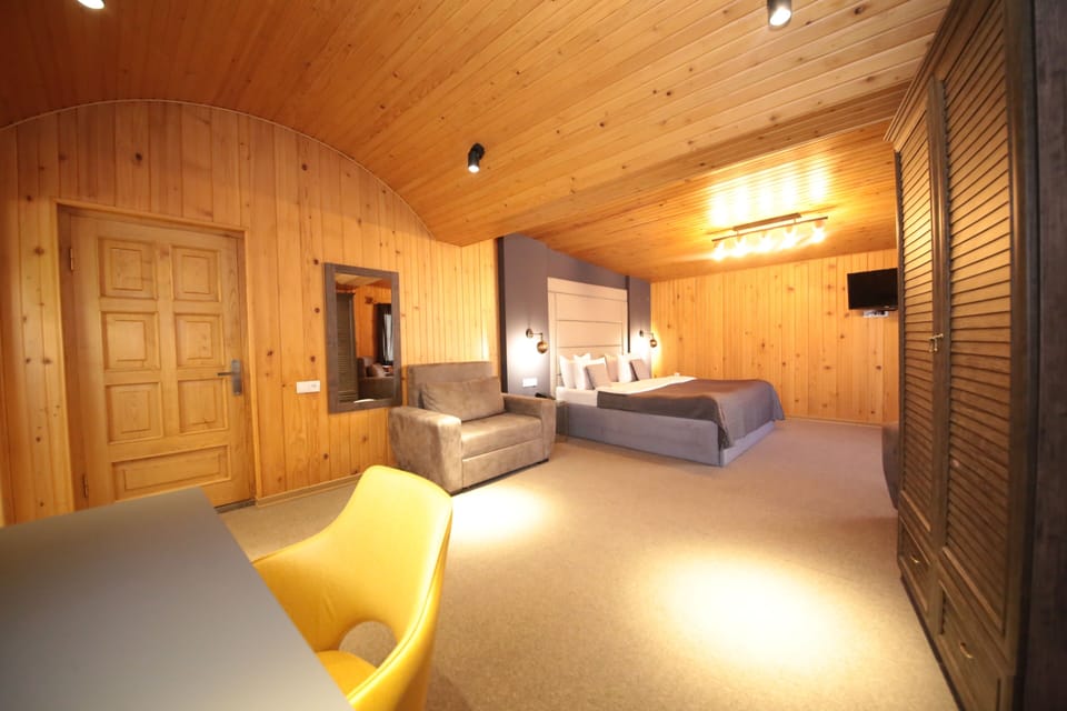 Family Room, Balcony | Living area | 60-cm flat-screen TV with digital channels, TV