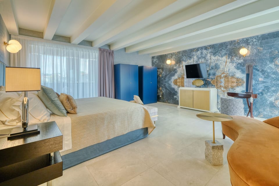 Presidential Suite, 2 Bedrooms, Jetted Tub, Lake View | Down comforters, memory foam beds, minibar, in-room safe