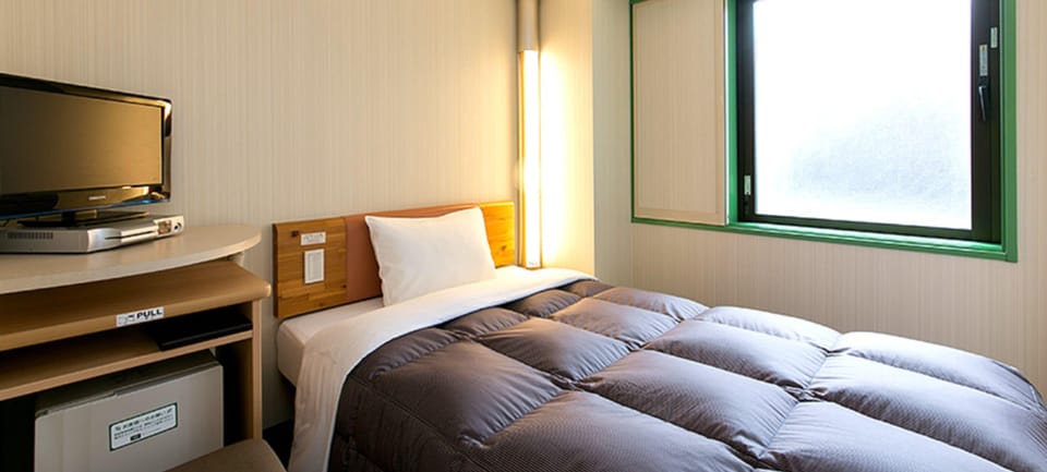 Down comforters, free wired internet, bed sheets