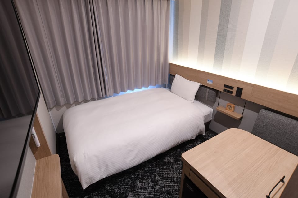 Down comforters, desk, free WiFi, bed sheets