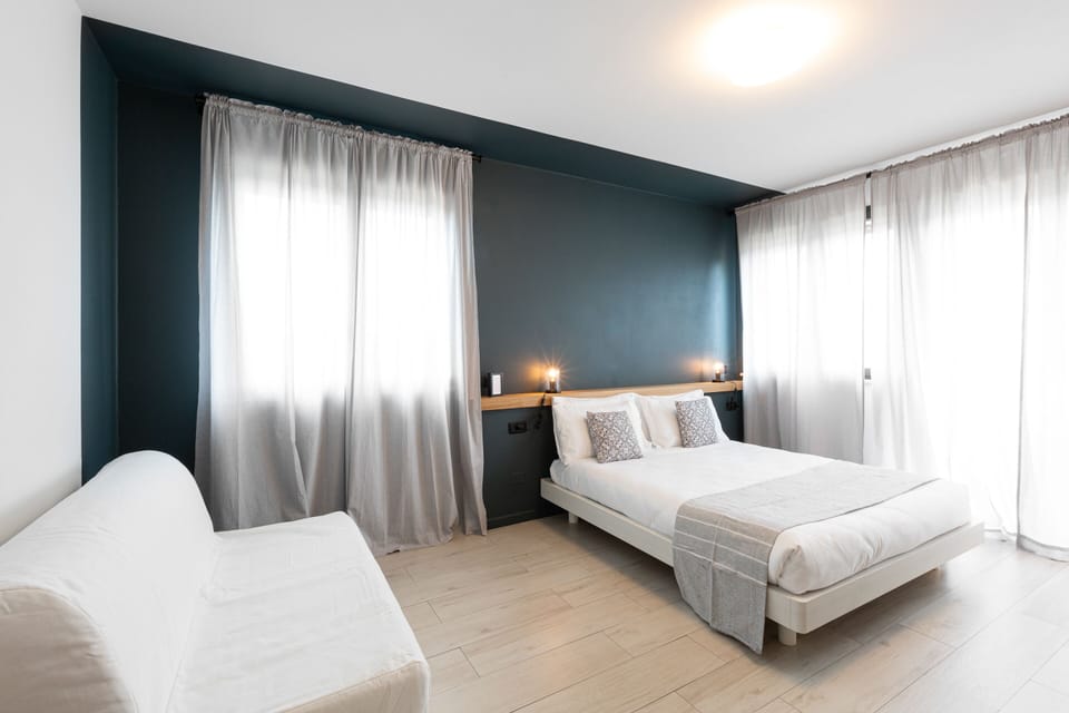 Quadruple Room | Premium bedding, down comforters, memory foam beds, minibar