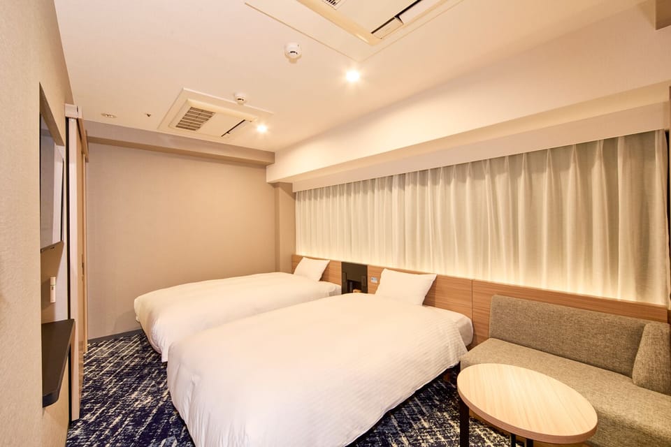 Twin Room, Non Smoking | Down comforters, free wired internet, bed sheets