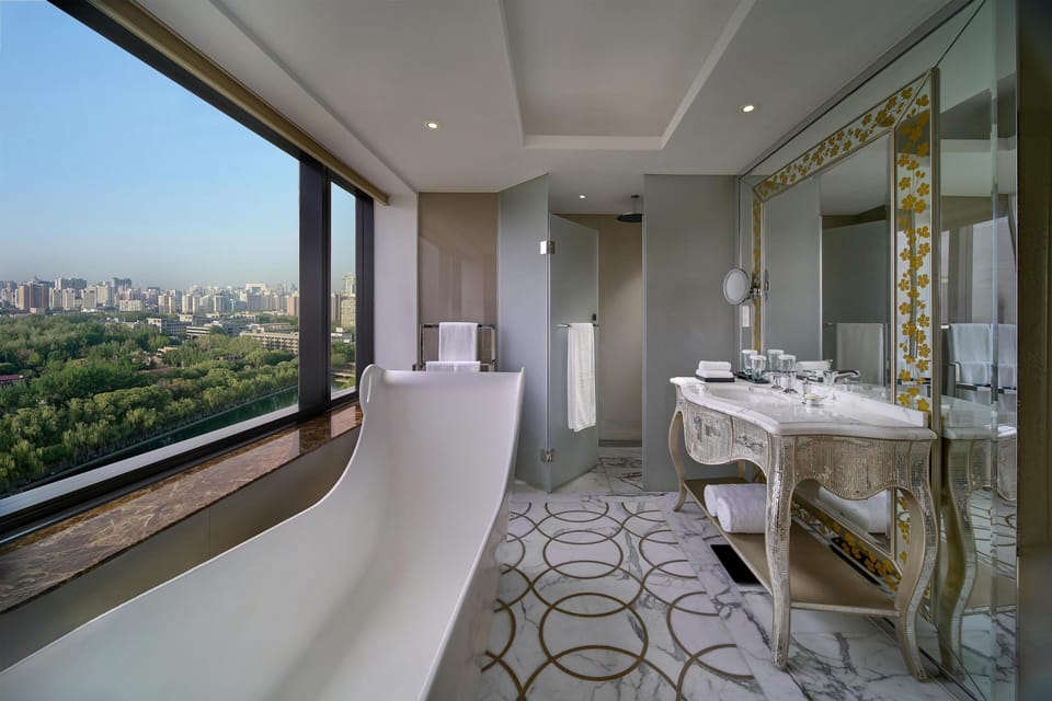 Rainfall showerhead, designer toiletries, hair dryer, bathrobes
