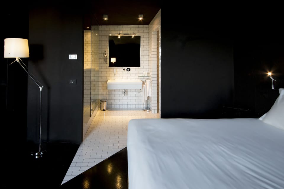 Hypo-allergenic bedding, down comforters, minibar, in-room safe