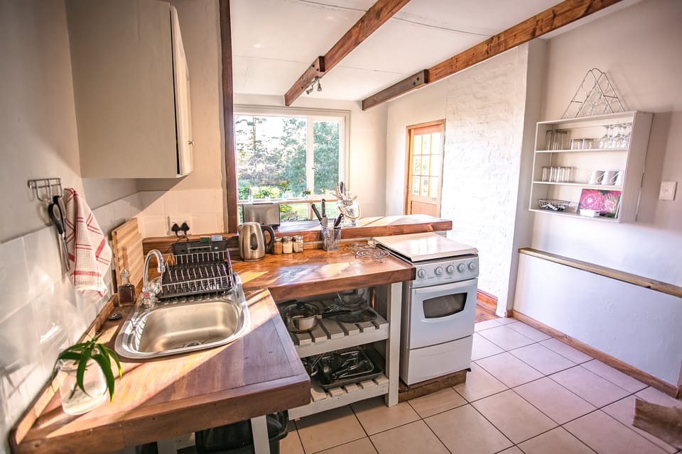 Honey Badger Forest Cottage 2 | Private kitchen | Fridge, electric kettle