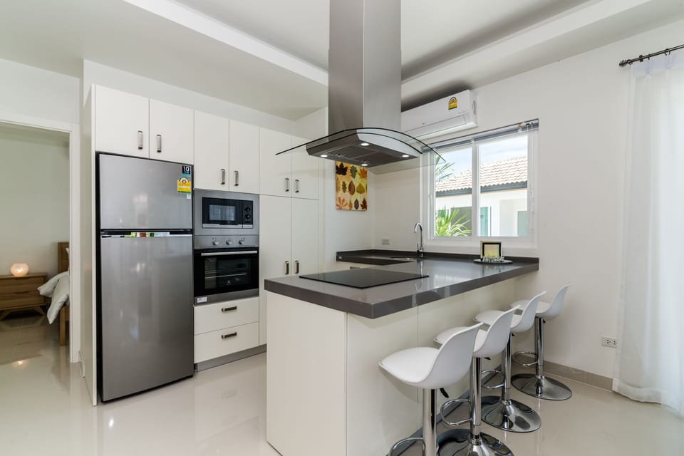 Superior Villa, 4 Bedrooms, Non Smoking, Kitchen | Private kitchen | Full-size fridge, microwave, oven, stovetop