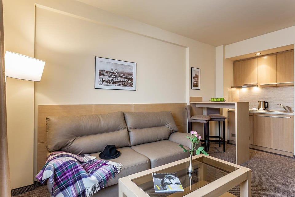 Comfort Apartment, 1 Bedroom | Living room | Flat-screen TV